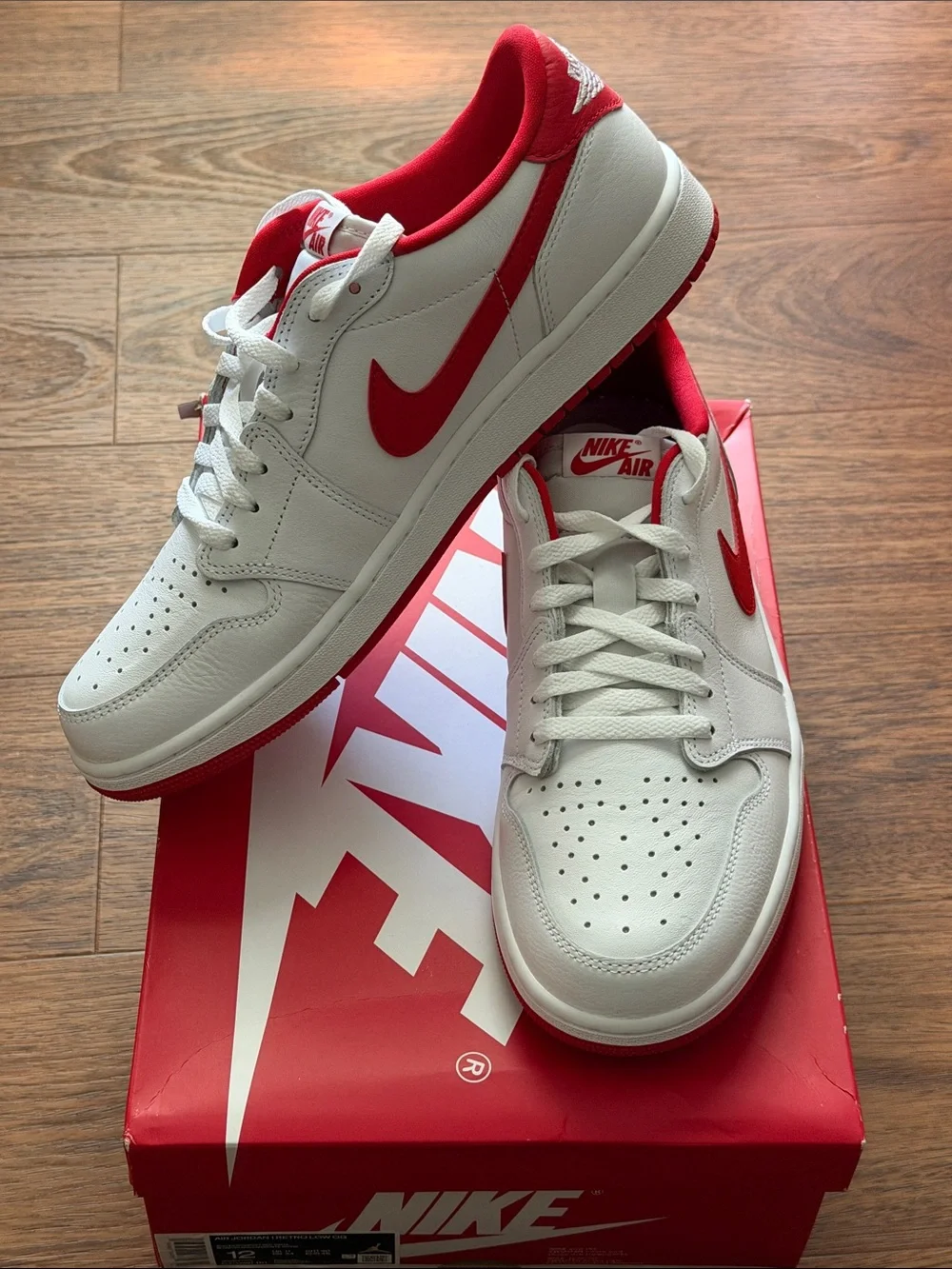 Brand New: Air Jordan 1 Low OG White and Red Sneakers.